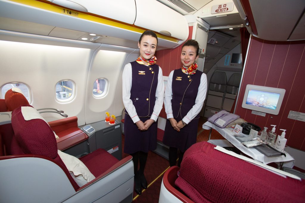 Flight attendants at Hainan Airlines ensure that the five-star rating of quality is ensured - Picture from Manchester Airport.