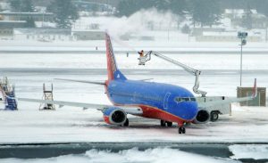 A Southwest Airlines 737 is deiced before takeoff in Manchester, New Hampshire