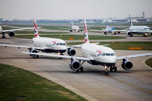 British Airways A319s taxi at London Heathrow.