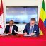 Ethiopian Airlines executives sign deal for new Twin Otter aircraft.