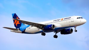 An Israir Airbus A320 registered as 4X-ABG seen landing at Tel Aviv Ben Gurion Airport.