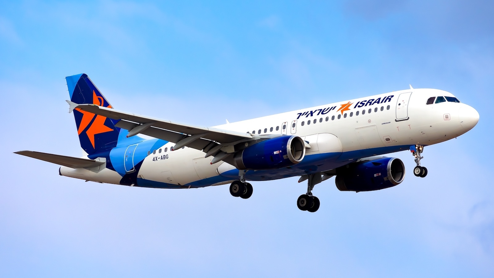 An Israir Airbus A320 registered as 4X-ABG seen landing at Tel Aviv Ben Gurion Airport.