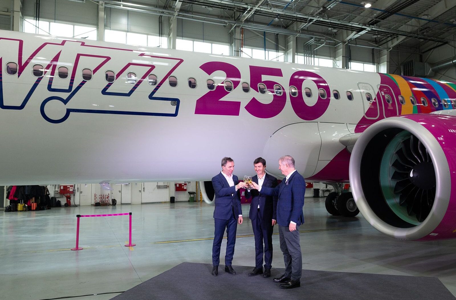 WIzz's CEO József Váradi, Airbus' Head of Commercial Europe Johan Pelissier and SMBC CEO Peter Barrett at the unveiling of the 250th aircraft special livery