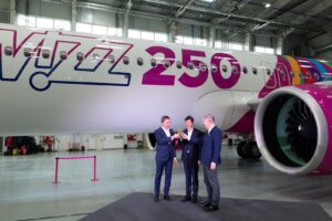 WIzz's CEO József Váradi, Airbus' Head of Commercial Europe Johan Pelissier and SMBC CEO Peter Barrett at the unveiling of the 250th aircraft special livery