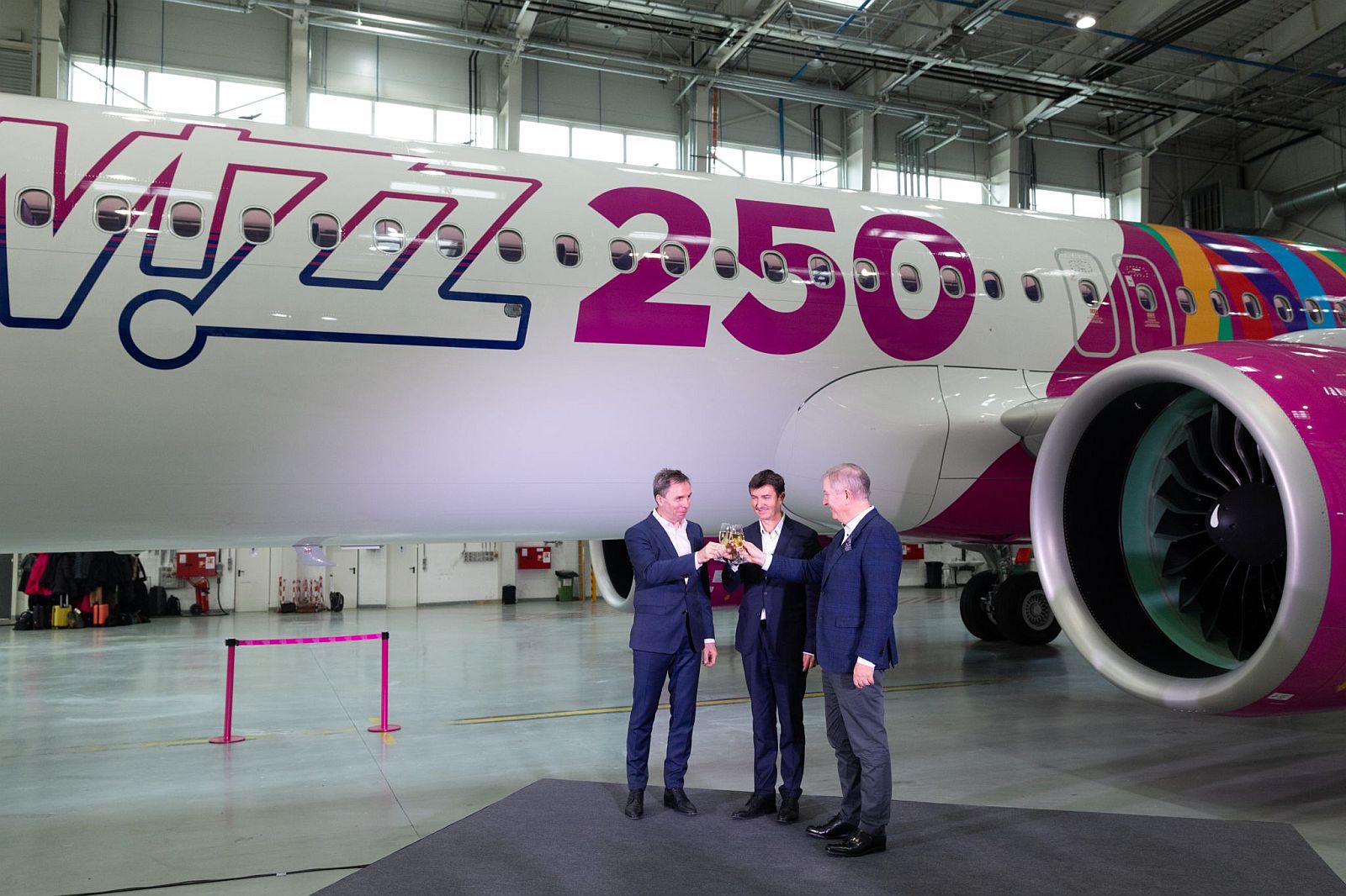 WIzz's CEO József Váradi, Airbus' Head of Commercial Europe Johan Pelissier and SMBC CEO Peter Barrett at the unveiling of the 250th aircraft special livery